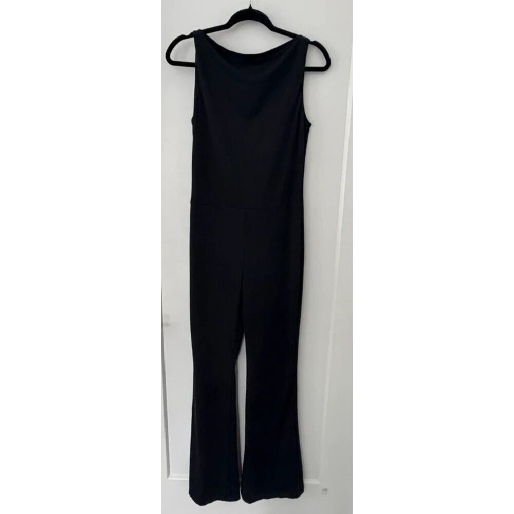 sleeveless, open-back flared leg jumpsuit